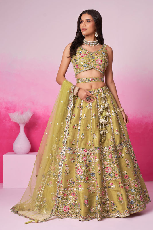 Mustard Heavy Net Sequence Worked Wedding Wear Lehenga Choli