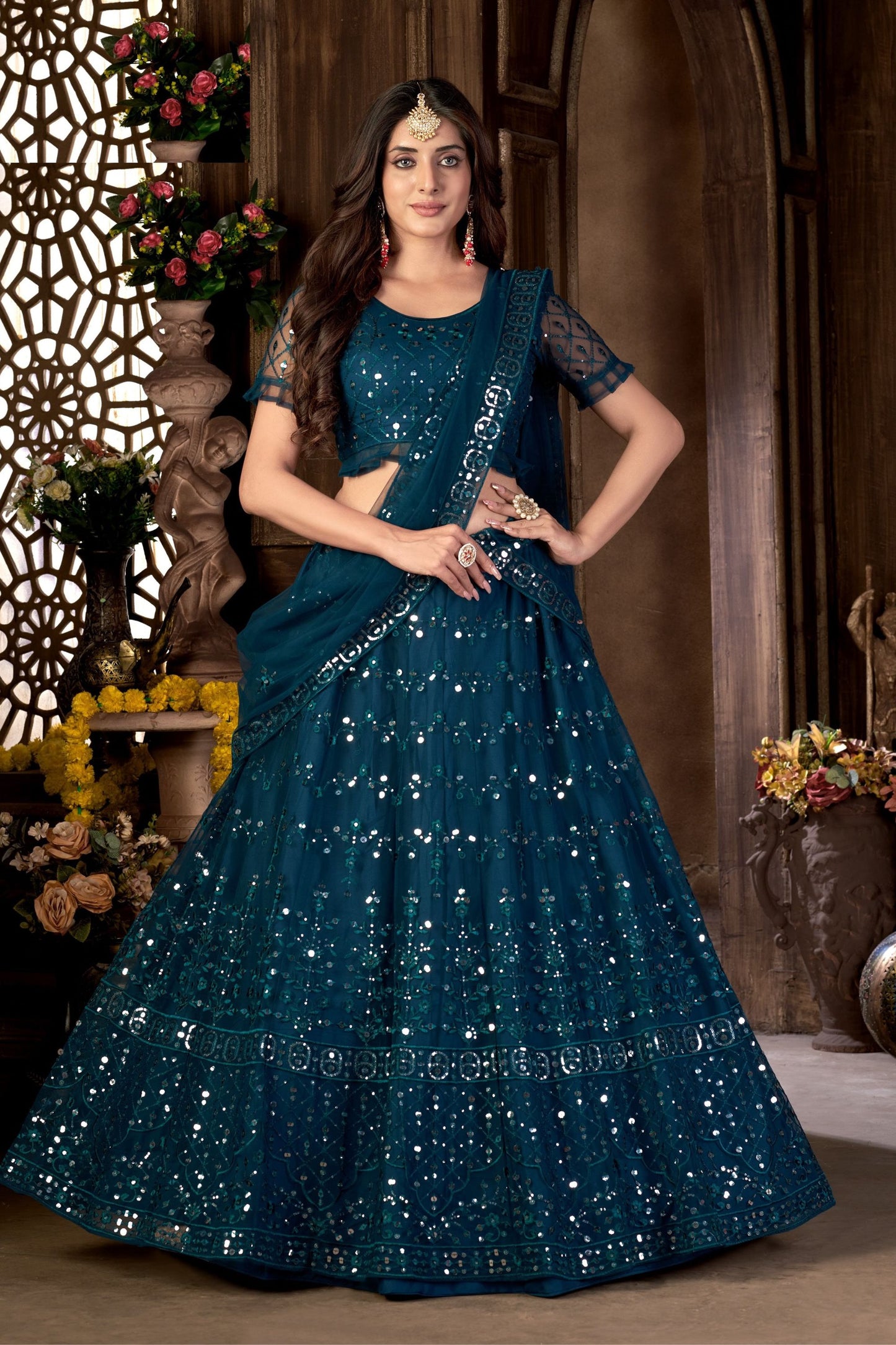 Blue Heavy Net Sequence Worked Wedding And Party Wear Lehenga Choli