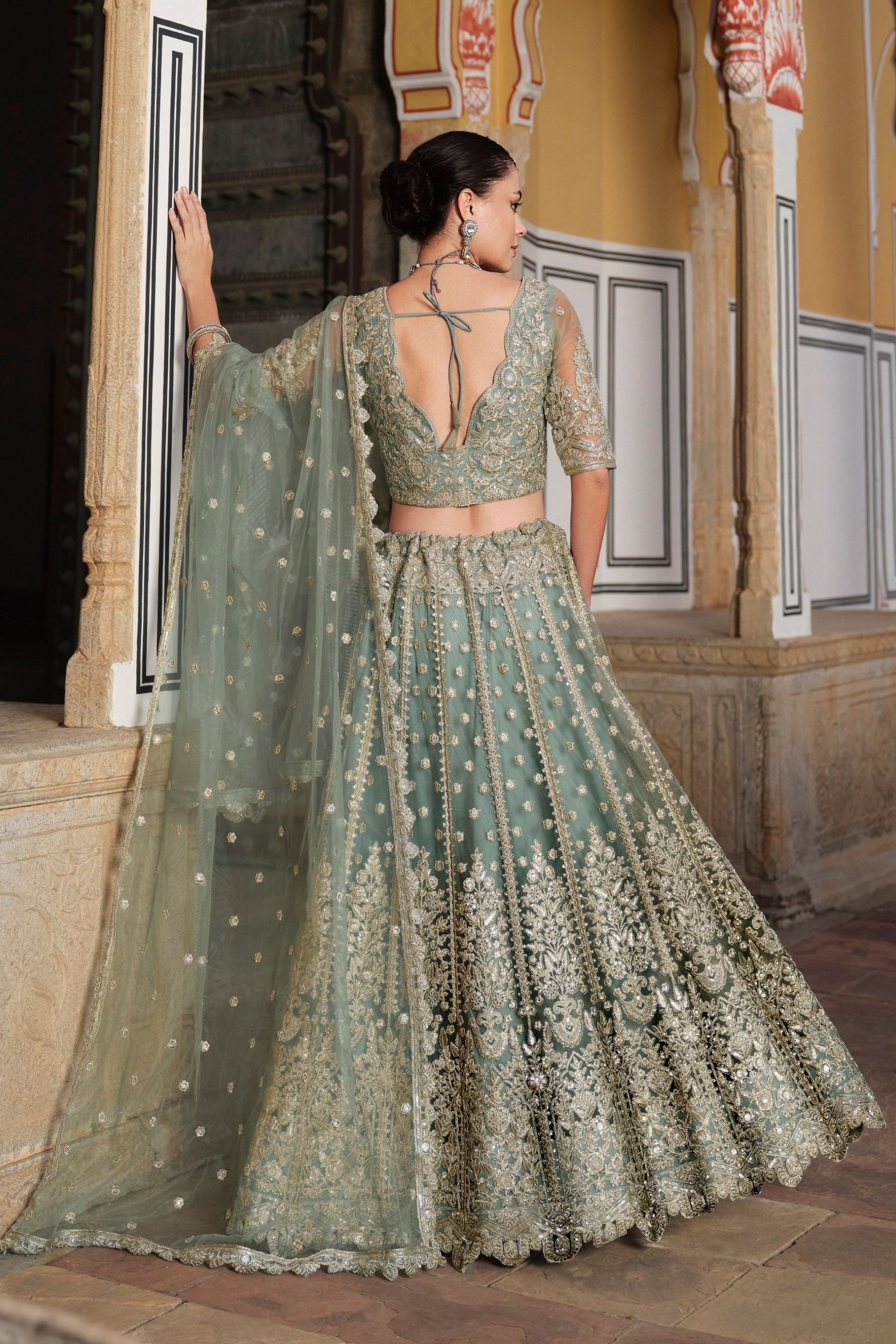 Mint Green Heavy Net Embroidery Worked Lehenga Choli 